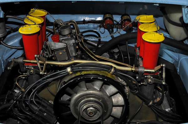 RETRO CLASSICS 2010, Stuttgart Messe, Stuttgart, Baden-Wuerttemberg, Germany, Europe, Insight into the engine compartment of a vehicle with yellow carburettors, Europe