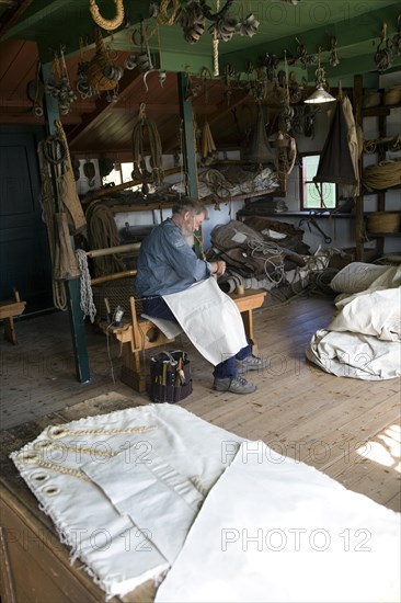 Sailmaker demonstration in workshop, Zuiderzee museum, Enkhuizen, Netherlands