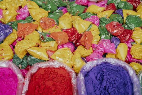 Vendor sells Holi celebration items in a street market, ahead of Holi festival on March 23, 2024 in Guwahati, Assam, India. Holi is the Hindu festival of colours, it is celebrated with great joy in India