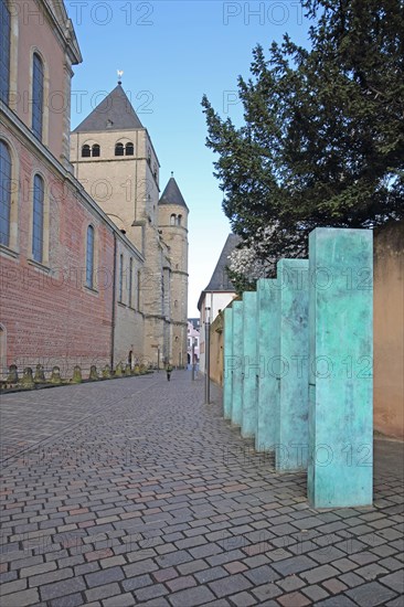 UNESCO St Peter's Cathedral and monument with green stelae on the Platz der Menschenwuerde, former Bischof-Stein-Platz, Trier, Rhineland-Palatinate, Germany, Europe