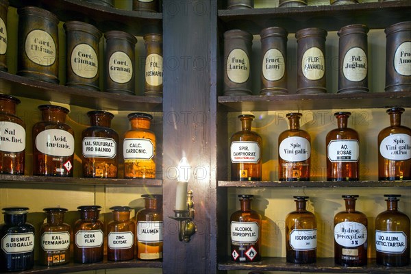 Glass jars with ingredients for medicines stand on a shelf in the historic Berg-Apotheke pharmacy in Clausthal-Zellerfeld, which was built in 1674 and is one of the oldest pharmacy buildings in Germany, 09 November 2015