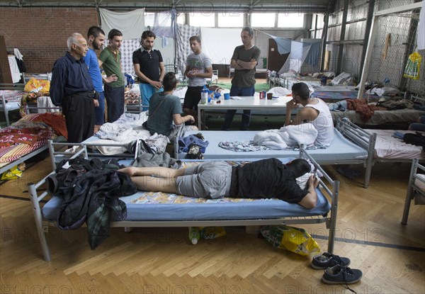 Refugees from Syria are housed in a gymnasium at the central contact point for asylum seekers in Brandenburg, 03/06/2015