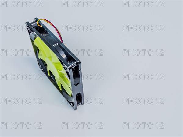 Green 120mm computer case fan with black frame and 3 prong pin power connection