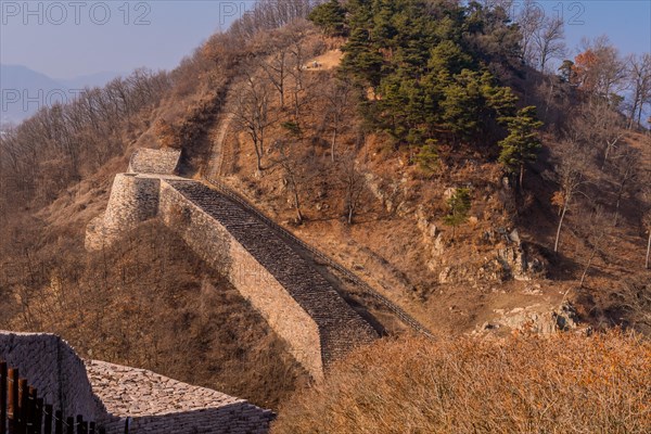Section of mountain fortress wall made of flat stones located in Boeun, South Korea, Asia