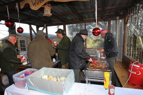 Wild boar (Sus scrofa) End of the hunt, cosy get-together, so-called Schuesseltreiben, tradition, Allgaeu, Bavaria, Germany, Europe