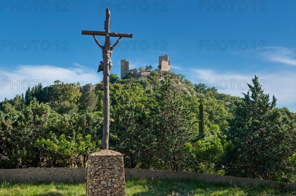 View from the old village mill Moulin Saint Roche to the ruins of Grimaud Castle, Grimaud-Village, Var, Provence-Alpes-Cote d'Azur, France, Europe