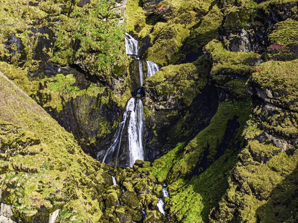 Waterfall in the rocks, near Vik, Sudurland, Iceland, Europe