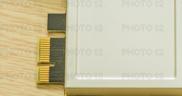 USB flash drives with beige casing and gold contacts visible, in South Korea