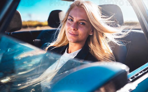 Blonde young woman driving open-top in blue convertible with waving hair, AI generated, AI generated
