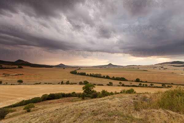 Bohemian low mountain range. Dramatic weather mood. Summer thunderstorms in the north of the Czech Republic