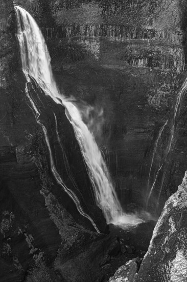 Foaming Halfoss waterfall, black and white photo, Sudurland, Iceland, Europe