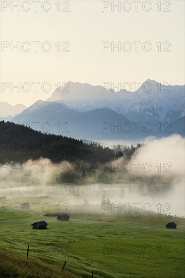 Sunrise and morning fog, Geroldsee or Wagenbruechsee, Kruen near Mittenwald, Werdenfelser Land, Upper Bavaria, Bavaria, Germany, Europe