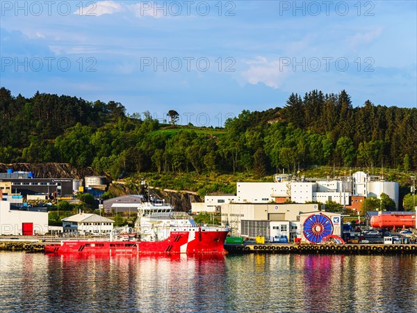 Ocean Osprey Offshore Supply Ship in Industrial Zone over FjordSailing, Stavanger, Boknafjorden, Norway, Europe