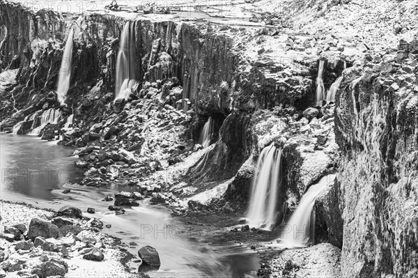 Hrauneyjarfoss waterfalls, onset of winter, black and white photo, Sudurland, Iceland, Europe