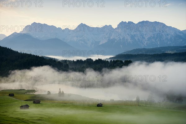 Sunrise and morning fog, Geroldsee or Wagenbruechsee, Kruen near Mittenwald, Werdenfelser Land, Upper Bavaria, Bavaria, Germany, Europe