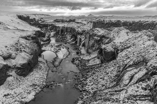 Hrauneyjarfoss waterfalls, onset of winter, black and white photo, Sudurland, Iceland, Europe