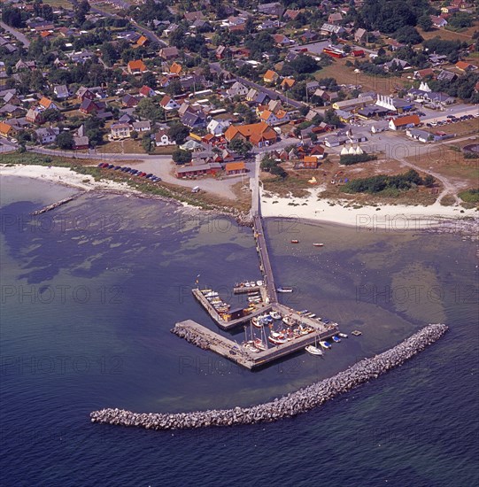 Aerial view of the fishing village Snogebaeck with its harbor out in the sea, southern Bornholm, Denmark, Baltic Sea, Scandinavia. Scanned 6x6 slide, Europe