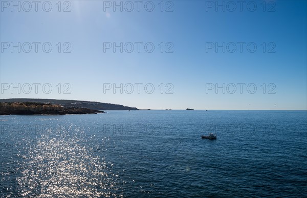 View of the sea with fishing boat from the Mirador de les Malgrats near Santa Ponca or Santa Ponsa, Majorca, Balearic Islands, Spain, Europe