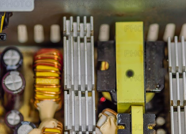 Internal heat sink and electrical components of used atx computer power supply