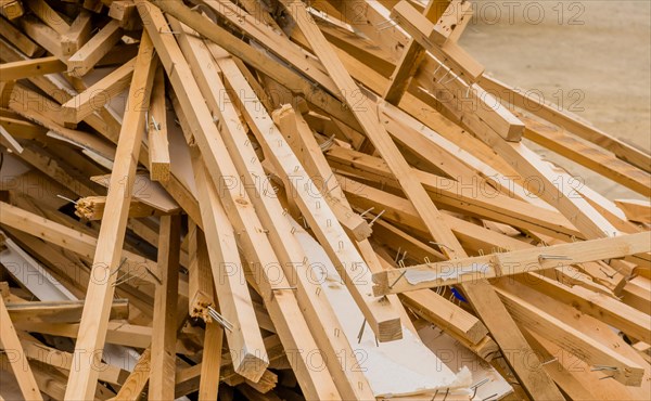 A large pile of wood scraps and lumber from construction waste, in South Korea