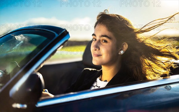Young woman driving open-top in blue convertible with blowing hair, AI generated, AI generated
