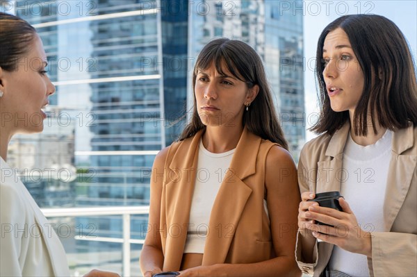 The female boss is informing her two employees that the break has concluded