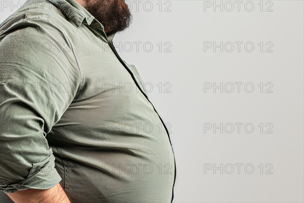 Close up of fat belly of heavily obese man in shirt on white background. KI generiert, generiert, AI generated