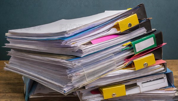 Colourful labels and clips on piles of files stand for order and office organisation, symbol bureaucracy, AI generated, AI generated