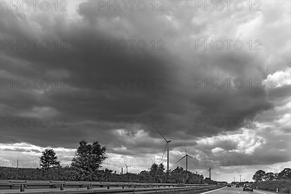 Wind turbines on the A 9 motorway, cloudy sky, Thuringia, Germany, Europe