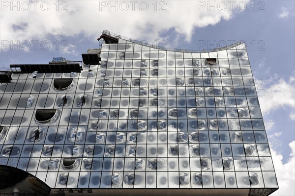 Elbe Philharmonic Hall, Exterior view, Modern building facade with reflective glass windows that mirror the sky and clouds, Hamburg, Hanseatic City of Hamburg, Germany, Europe