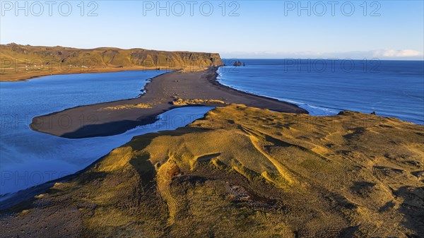 Dyrholaos lagoon in the evening light, drone shot, Sudurland, Iceland, Europe