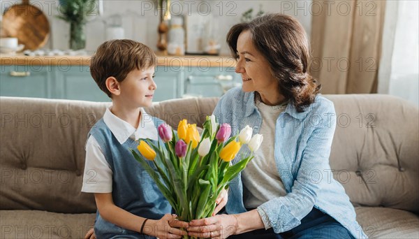 A mother and her son sit on the sofa and hold a bunch of tulips together, AI generated, AI generated