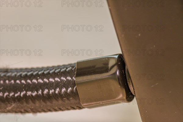 Close-up of a chrome bike handlebar end showing a reflective surface, in South Korea