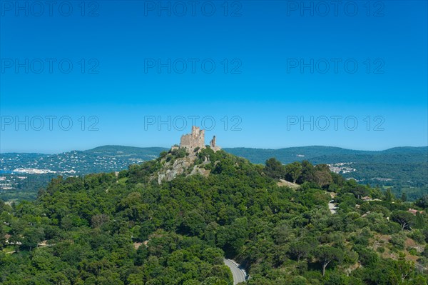 Landscape with the castle of Grimaud, in the background the hills of the Massif des Maures, Grimaud-Village, Var, Provence-Alpes-Cote d'Azur, France, Europe