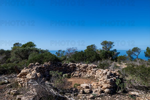 Circle of fieldstones in the former restricted military area of the Toro peninsula seen from Majorca, Balearic Islands, Spain, Europe