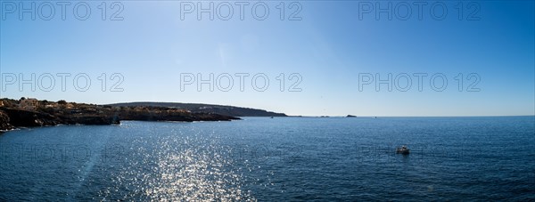 View of the sea with fishing boat from the Mirador de les Malgrats near Santa Ponca or Santa Ponsa, Majorca, Balearic Islands, Spain, Europe