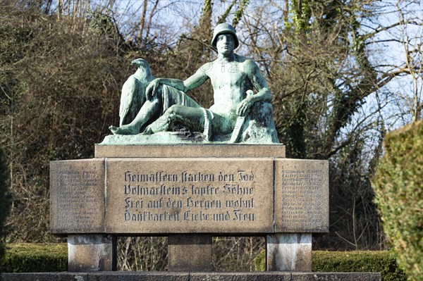 Memorial to the victims of the wars of 1866 and 1870 to 1871, inscription, war memorial, memorial with pedestal and sculpture at the Volmarstein castle ruins, in the background bushes, trees and hedges, Wetter an der Ruhr, Ruhr area, Germany, Europe