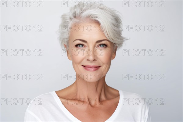 Portrait of middle-aged woman with short gray hair on white background. KI generiert, generiert, AI generated