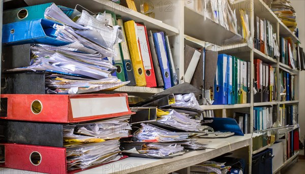 Many cluttered and chaotic files on shelves in an office, symbol bureaucracy, AI generated, AI generated