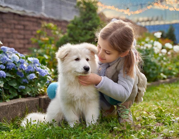 Dog, puppies of a white shepherd dog playing with a five-year-old girl in the garden, AI generated, AI generated