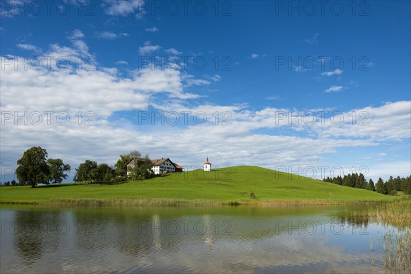 Hegratsrieder See with chapel and farm, near Fuessen, Ostallgaeu, Allgaeu, Bavaria, Germany, Europe
