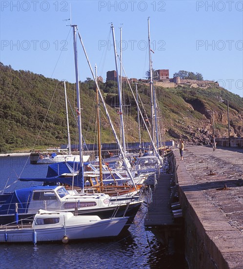 The harbor Hammerhavnen at Hammershus, which was Scandinavia's largest medieval fortification and is one of the largest medieval fortifications in northern Europe. Now a ruin and located on the island of Bornholm, Denmark, Baltic Sea, Scandinavia. Scanned 6x6 slide, Europe