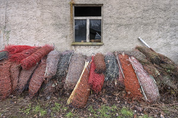 Discarded pasture fences on a shed, Othenstorf, Mecklenburg-Western Pomerania, Germany, Europe