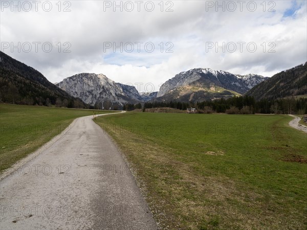 Country road in front of mountain panorama, mountain Pribitz, mountain Messnerin, Oberort, municipality Tragoess-St. Katharein, Styria, Austria, Europe
