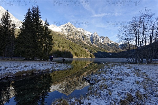 Winter on an icy lake, Lake Antholz in the Antholz Valley, Val Pusteria, South Tyrol, Italy, Europe