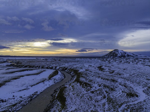 Overgrown river landscape, onset of winter, sunset, volcanic hills, Fjallabak Nature Reserve, drone shot, Sudurland, Iceland, Europe