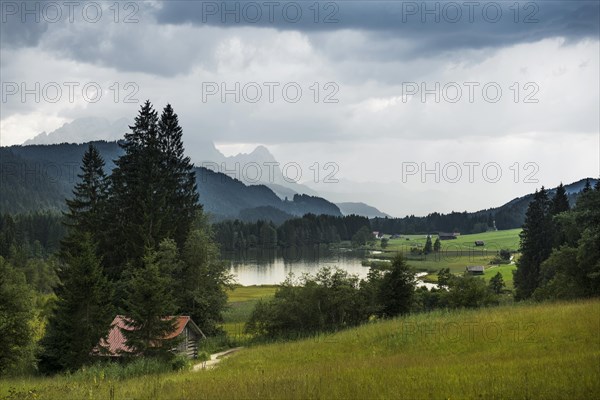 Storm clouds, Geroldsee or Wagenbruechsee, Kruen near Mittenwald, Werdenfelser Land, Upper Bavaria, Bavaria, Germany, Europe