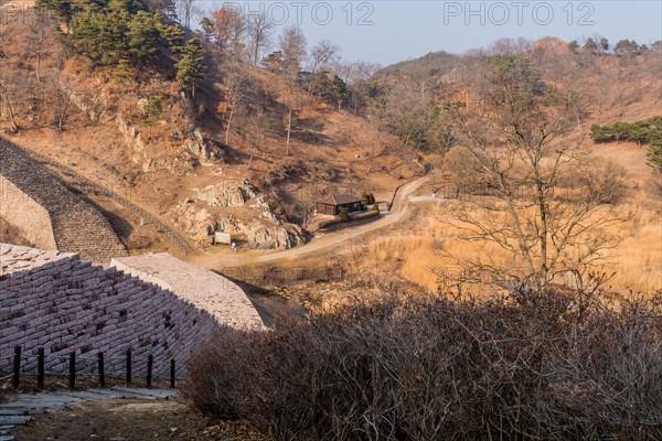 Landscape of entrance to Sanseong mountain park through main gate of Samnyeon Mountain Fortress wall in Boeun, South Korea, Asia