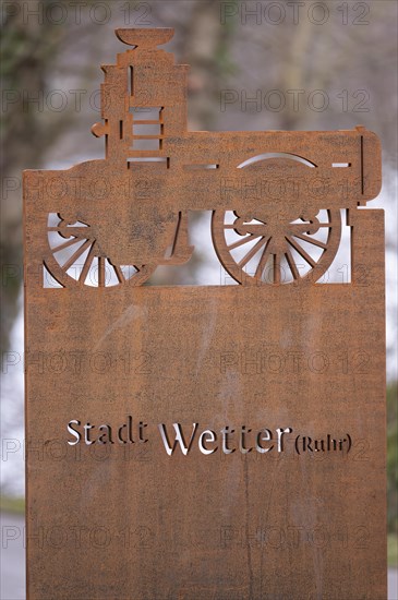 New metal layer on the banks of the Ruhr, along the path from Wetter to Herdecke, rusty appearance, inscription city of Wetter (Ruhr), background blurred, Wetter an der Ruhr, Ruhr area, Germany, Europe