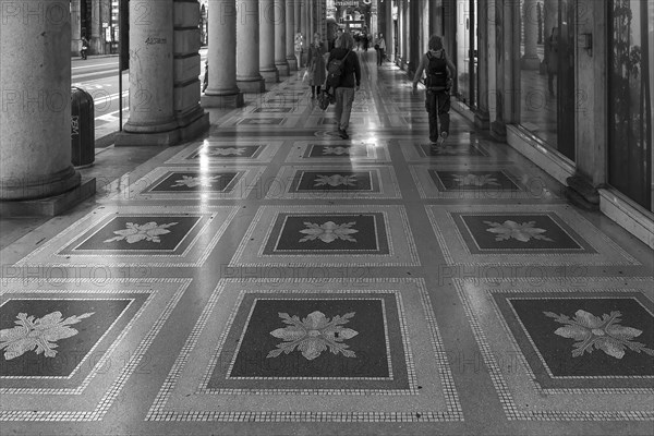 Mosaic floor in the historic arcades of the former Palazzo of the Italian General Navigation, built in 1908, today seat of the Liguria Regional Council, Genoa, Italy, Europe